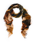 The Heart of an Angel scarf by SUZI ROHER is a lightweight silk-modal piece with frayed edges, featuring a classical portrait in warm, earthy tones. Loosely rolled on a white background, it elegantly expresses gentle warmth.