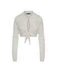 The Absolutely cardigan by HIGH is a white, long-sleeve, fitted cropped piece with a front keyhole cutout, ruched details, and a waist tie bow.