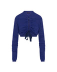 The HIGH "Absolutely" cardigan is a royal blue, long-sleeve, cropped fitted piece with a ruched front, black ribbon waist tie, and stylish textured fabric.