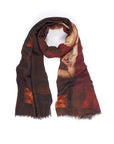 The SUZI ROHER "Private Views" scarf is a 70x200cm wool-modal blend with warm-toned printed artwork, frayed edges, and is shown loosely rolled in a circle on a white background.