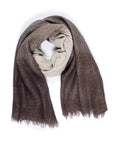 The SUZI ROHER Elena scarf features a cozy winter ombre, blending light beige to dark brown with subtle metallic threads and fringed edges. Warm and inviting, it's shown in a loose circle on a white background.