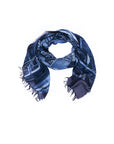 A SUZI ROHER scarf, named “Lily, Vogue Italia B&W,” featuring a subtle, digitally printed pattern and frayed edges in dark blue tones, is loosely coiled in a circular shape on a white background.