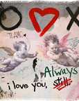 The Love You Always scarf by SUZI ROHER features classical cherubs overlaid with graffiti text—O, X, red heart, "TI AMO," "i love you," and more—evoking Italian romance for a meaningful gift.