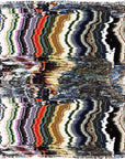 Multicolored abstract pattern with fringes on a textured surface