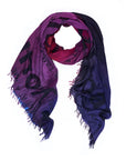 Introducing “Your Own Pace” by SUZI ROHER—a scarf with fringed edges, showcasing original artwork in a gradient from magenta to dark purple, adorned with large, bold black lettering printed across the fabric. This digitally printed piece is expertly finished in Italy.