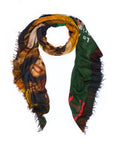 The “Elle” scarf by SUZI ROHER showcases vibrant abstract patterns and partial images of a woman’s face, its multicolored fabric artistically finished with frayed edges. Draped in a loop against a white background, this original artwork pays tribute to women’s empowerment and would be a striking statement piece in any fashion magazine.