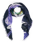 A loosely folded, rectangular SUZI ROHER "Authentic" modal silk scarf with frayed edges features abstract purple, green, black, and white patterns. Made in Italy and displayed on a white background.