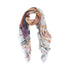 The Suzi Roher "Lucky In Love" scarf is a lightweight, rectangular modal silk piece with frayed edges and an abstract multicolored print in brown, purple, blue, and beige, styled in a loose circle for timeless 1940s allure.