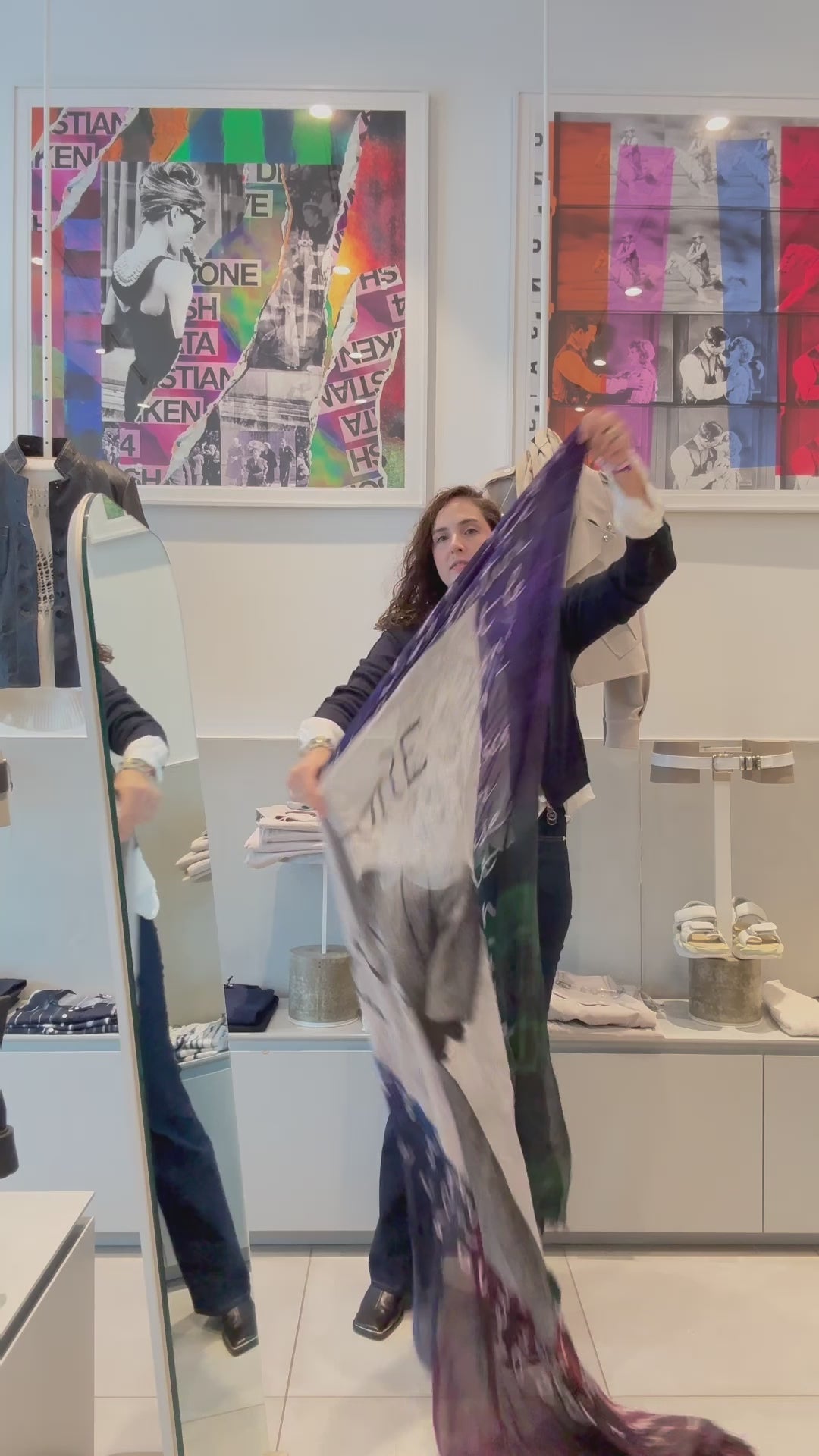 A women putting on A scarf with a vintage fashion illustration of a woman in a gray outfit, surrounded by colorful plaid patterns and text. Showing how the colours wrap.