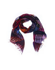 The “Lily, Tutti Matti” scarf by SUZI ROHER, displayed in a loose loop on a white background, showcases original Venice postcard-inspired artwork in vibrant plaid patterns with fringed edges and a digital print finish.