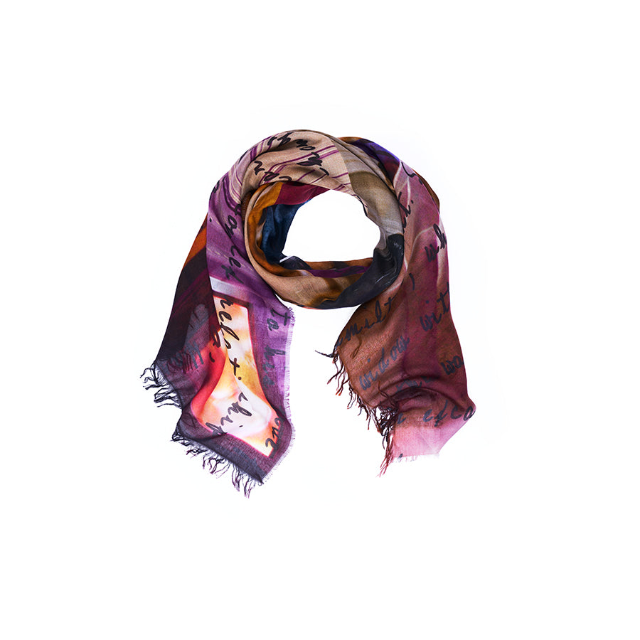 Introducing “Lily, Scarlett” by SUZI ROHER—a vibrant scarf featuring an abstract pattern inspired by original artwork and script text in rich dark hues. Digitally printed and loosely rolled with frayed edges, this piece is beautifully displayed on a white background.