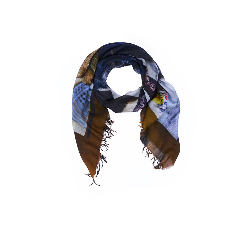 Introducing the Lily, James Bond scarf by SUZI ROHER—a lightweight accessory with frayed edges, digitally printed with original multicolored abstract artwork in shades of brown, blue, and gray. Shown against a white background.