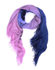The 4 Paths of Yoga scarf by SUZI ROHER is a lightweight women's accessory with frayed edges, featuring a gradient from light pink to deep navy blue, loosely twisted into a loop.