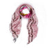 The SUZI ROHER "Love Is Life" scarf features a light pink hue, frayed edges, black "LIFE LOVE IS" text throughout, and showcases abstract colorful patterns arranged in a stylish loose loop.