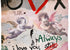 The SUZI ROHER "Lily, Love You Always" scarf transforms a classical cherub painting with graffiti-style hearts and love notes in vibrant colors—a unique, passionate gift.