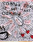 Collage of cut-out words and phrases on a textured background. A scarf about women's empowerment, black and white with colourful pink and orange edges.