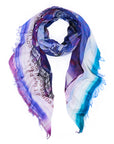 Multicolored scarf with text and patterns on a white background, blue, purple, pink colours.