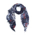 The SUZI ROHER Love Bug scarf is a lightweight, rectangular modal silk accessory with frayed edges, showcasing a black, white, and gray tie-dye pattern and bold “LOVE” text in red and black.